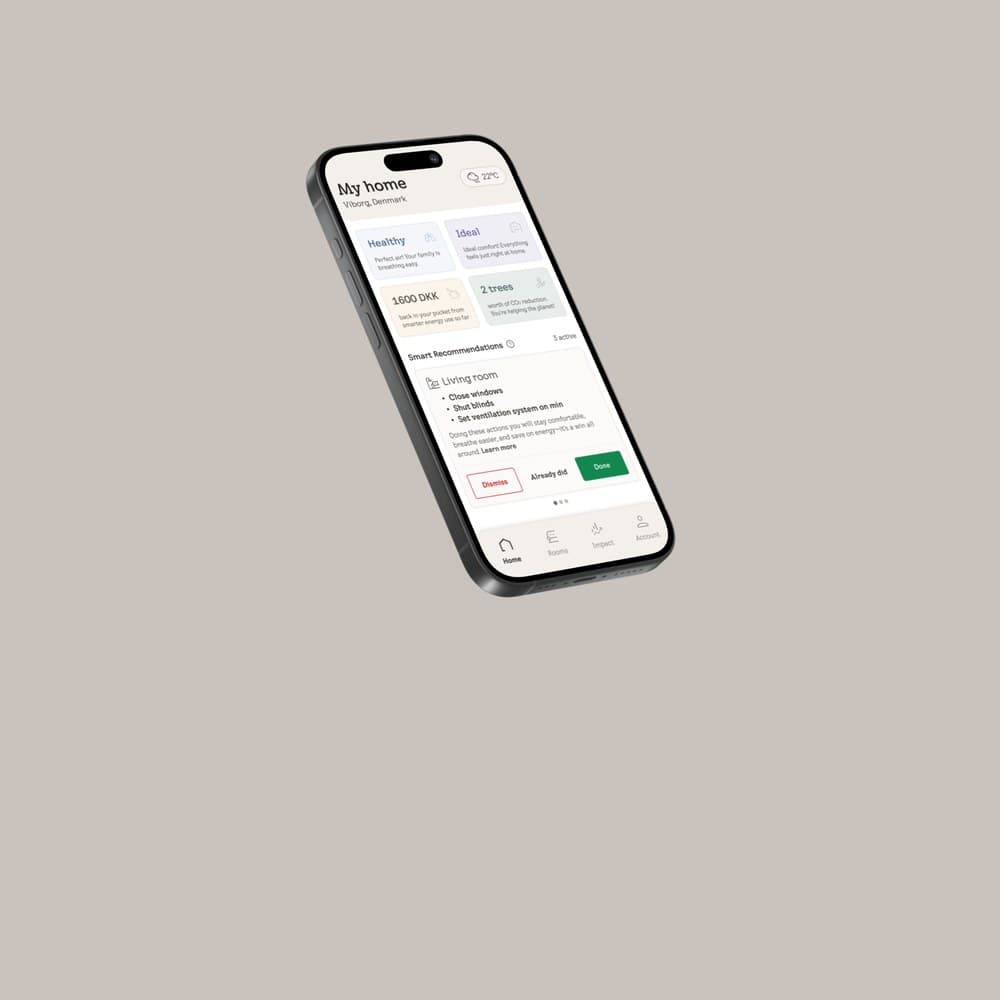 The Smart Climate app on a phone, showing the rooms of a home and their current conditions.