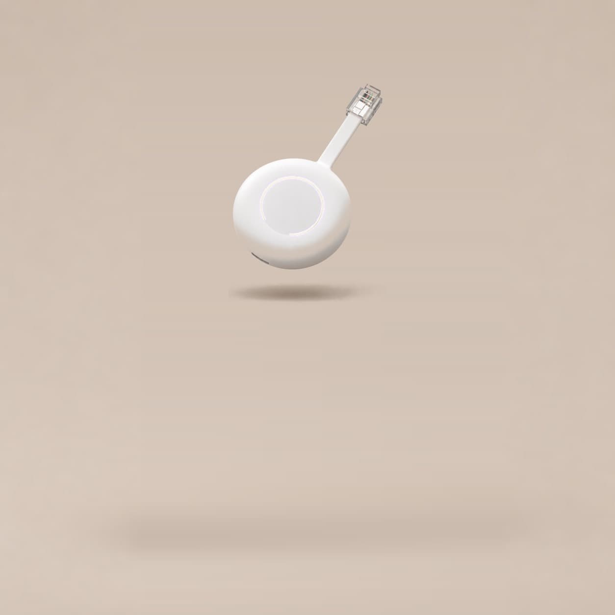 The smart connector, a round white puck with a softly lit ring and a short cable ending in a network plug.